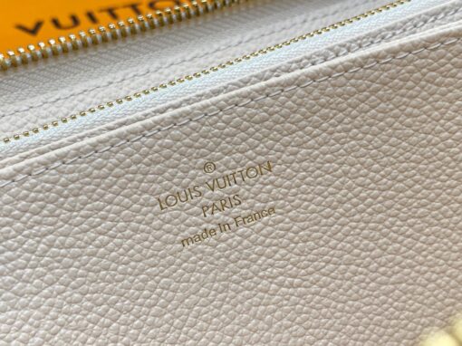 LOUIS VUITTON Zippy Wallet – Where Luxury Meets Functionality. Presenting the exquisite Zippy wallet, a coveted piece from the LV Gradient collection for this season. Meticulously fashioned using grained, embossed Monogram Empreinte leather, it showcases a gracefully transitioning spectrum of summery hues. This iconic wallet is distinguished by its sleek, slender profile, dependable zip closure, and ingeniously designed interior replete with an array of card slots, pockets, and compartments, ensuring both style and functionality in one harmonious package.