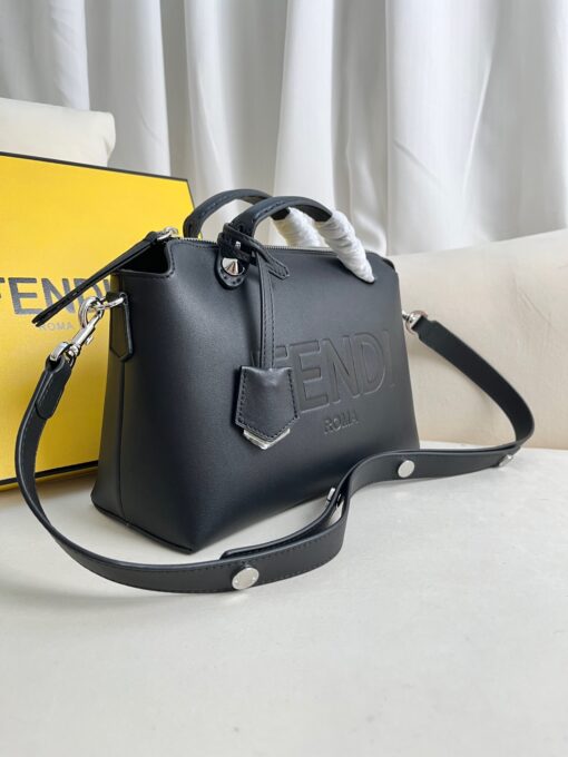 FENDI By The Way- Where Luxury Meets Versatility in Every Detail. Introducing the medium-sized iconic By The Way Boston bag, expertly crafted from luxurious leather and adorned with the prestigious "FENDI ROMA" hot-stamp detail, elegantly sealed with a secure zipper closure. Versatility meets style with multiple carrying options, as you can gracefully hold it by the handles, sling it over your shoulder, or even wear it cross-body, thanks to the adjustable and detachable shoulder strap. Elevate your everyday with the By The Way Boston bag, where elegance meets functionality.