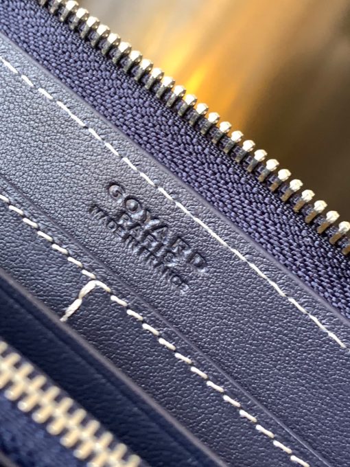 GOYARD Matignon GM Wallet: A Statement of Elegance and Functionality. Experience luxury and functionality with the Goyard Matignon GM Wallet. Crafted from premium calf leather and Goyardine canvas, it offers twelve card slots, a zipper pocket, and two spacious compartments, all secured by a snap button closure. Handcrafted by skilled artisans, Whether you're running errands or gracing a formal occasion, this wallet is the ultimate style companion. Choose from an array of colors to reflect your personality and elevate your ensemble. With this wallet, you'll not only radiate elegance but also experience unparalleled functionality.