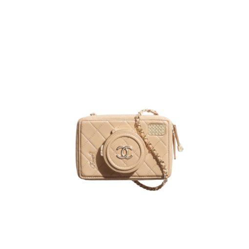 CHANEL Camera Bag. A pinnacle of timeless elegance and contemporary sophistication. This iconic piece showcases exquisite craftsmanship and meticulous attention to detail. The camera bag design exudes versatility and style, offering a modern reinterpretation of a classic silhouette. Made from premium materials, it boasts buttery-soft lambskin leather, adorned with the iconic quilted pattern synonymous with CHANEL's heritage. With its compact yet spacious interior, the Camera Bag effortlessly accommodates all your essentials while maintaining a sleek and streamlined profile. The signature Chanel interlocking CC logo adorns the front, adding a touch of unmistakable luxury to the design.