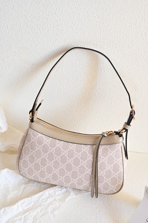 GUCCI Ophidia Small Handbag. Authentic quality luxury bag crafted in genuine leather comes with authenticity card, dust bag and gift bag. Unwavering Style: Discover Enduring Ophidia Collection. House collections embody the notion of timelessness as opposed to fleeting trends. Guccio Gucci's iconic monogram perpetually enhances novel designs, exuding a distinct logo allure. This exquisite Ophidia small handbag triumphantly showcases the prestigious GG Supreme canvas, adorned with the striking Double G hardware.