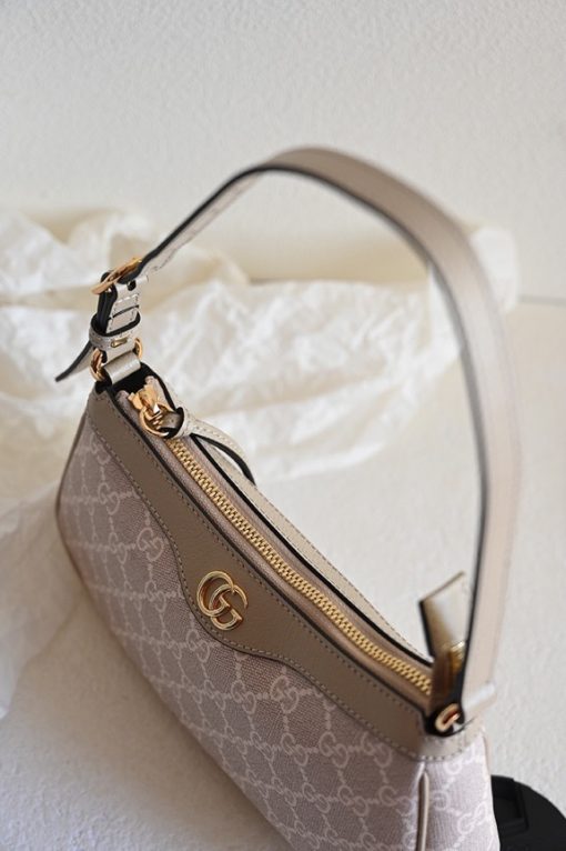 GUCCI Ophidia Small Handbag. Authentic quality luxury bag crafted in genuine leather comes with authenticity card, dust bag and gift bag. Unwavering Style: Discover Enduring Ophidia Collection. House collections embody the notion of timelessness as opposed to fleeting trends. Guccio Gucci's iconic monogram perpetually enhances novel designs, exuding a distinct logo allure. This exquisite Ophidia small handbag triumphantly showcases the prestigious GG Supreme canvas, adorned with the striking Double G hardware.