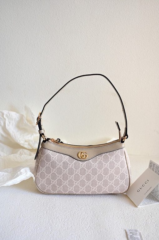 GUCCI Ophidia Small Handbag. Authentic quality luxury bag crafted in genuine leather comes with authenticity card, dust bag and gift bag. Unwavering Style: Discover Enduring Ophidia Collection. House collections embody the notion of timelessness as opposed to fleeting trends. Guccio Gucci's iconic monogram perpetually enhances novel designs, exuding a distinct logo allure. This exquisite Ophidia small handbag triumphantly showcases the prestigious GG Supreme canvas, adorned with the striking Double G hardware.