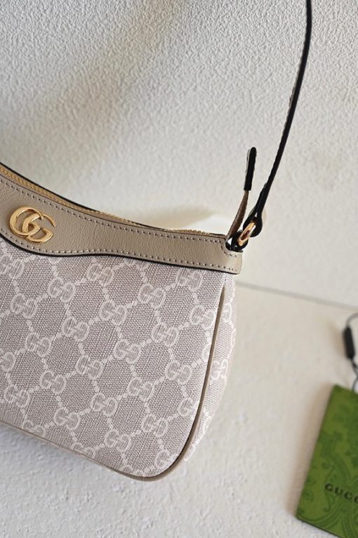 GUCCI Ophidia Small Handbag. Authentic quality luxury bag crafted in genuine leather comes with authenticity card, dust bag and gift bag. Unwavering Style: Discover Enduring Ophidia Collection. House collections embody the notion of timelessness as opposed to fleeting trends. Guccio Gucci's iconic monogram perpetually enhances novel designs, exuding a distinct logo allure. This exquisite Ophidia small handbag triumphantly showcases the prestigious GG Supreme canvas, adorned with the striking Double G hardware.