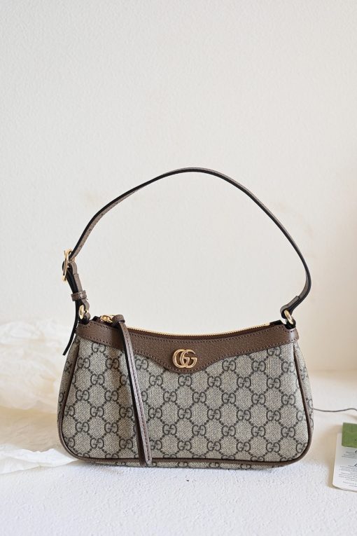 GUCCI Ophidia Small Handbag. Authentic quality luxury bag crafted in genuine leather comes with authenticity card, dust bag and gift bag. Unwavering Style: Discover Enduring Ophidia Collection. House collections embody the notion of timelessness as opposed to fleeting trends. Guccio Gucci's iconic monogram perpetually enhances novel designs, exuding a distinct logo allure. This exquisite Ophidia small handbag triumphantly showcases the prestigious GG Supreme canvas, adorned with the striking Double G hardware.