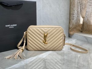SAINT LAURENT Lou Camera Bag in Quilted Leather. Authentic quality luxury bag crafted in genuine leather comes with authenticity card, dust bag and gift bag. Experience timeless elegance with YSL's iconic monogram shoulder bag, the epitome of luxury and chic sophistication. The bag in question is undoubtedly one of ST *AURENT's highly coveted crossbody bags, cherished for its exquisite design and functionality. Its arrival on the luxury designer scene has injected a much-needed breath of fresh air into the realm of small-to-medium crossbody bags. Crafted with meticulous attention to detail, this monogram shoulder bag boasts an adjustable leather strap, a detachable leather tassel, and interlaced YSL initials elegantly displayed in metal at the center. The added touch of quilted overstitching further elevates its allure and charm. - KRIS + KIKO SAINT LAURENT Lou Camera Bag in Quilted Leather. The bag is one of Saint Laurent’s most popular crossbody bags. This brings some much needed variety to the selection of small-to-medium crossbody bags available on the luxury designer scene right now. This monogram shoulder bag featuring an adjustable leather strap, removable leather tassel, interlaced YSL initials in metal at the center and quilted overstitching.