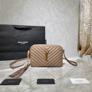 SAINT LAURENT Lou Camera Bag in Quilted Leather. Authentic quality luxury bag crafted in genuine leather comes with authenticity card, dust bag and gift bag. Experience timeless elegance with YSL's iconic monogram shoulder bag, the epitome of luxury and chic sophistication. The bag in question is undoubtedly one of ST *AURENT's highly coveted crossbody bags, cherished for its exquisite design and functionality. Its arrival on the luxury designer scene has injected a much-needed breath of fresh air into the realm of small-to-medium crossbody bags. Crafted with meticulous attention to detail, this monogram shoulder bag boasts an adjustable leather strap, a detachable leather tassel, and interlaced YSL initials elegantly displayed in metal at the center. The added touch of quilted overstitching further elevates its allure and charm. - KRIS + KIKO SAINT LAURENT Lou Camera Bag in Quilted Leather. The bag is one of Saint Laurent’s most popular crossbody bags. This brings some much needed variety to the selection of small-to-medium crossbody bags available on the luxury designer scene right now. This monogram shoulder bag featuring an adjustable leather strap, removable leather tassel, interlaced YSL initials in metal at the center and quilted overstitching.