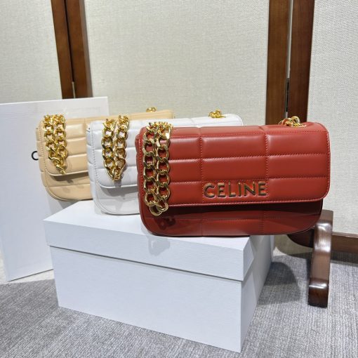 CELINE Matelasse Monochrome Chain Shoulder Bag. Authentic quality luxury bag crafted in genuine leather comes with authenticity card, dust bag and gift bag. Elevate your style with the chic versatility. This stunning shoulder bag features a beautiful graphic goatskin quilting and the monochrome Celine logo in metal lettering. It is further enhanced with an oversized chain strap, allowing for versatile wearing options, including wearing it cross-body.