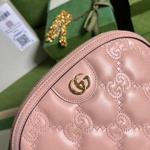 GUCCI GG Matelassé Small Bag. Authentic quality luxury bag crafted in genuine leather comes with authenticity card, dust bag and gift bag. Contemporary Luxury in Geometric Perfection Matelassé leather continuously takes center stage in the Creative Director's designs, showcasing new and innovative interpretations every season. Featuring a luxuriously smooth texture, this distinctive material has been reimagined as a textured geometric motif for the Gucci Love Parade. This modern design offers a fresh twist on the '90s logo trend, seen prominently in the House's recent collections. A rounded shoulder bag has been enriched with this exquisite matelassé leather, adding a touch of contemporary elegance.
