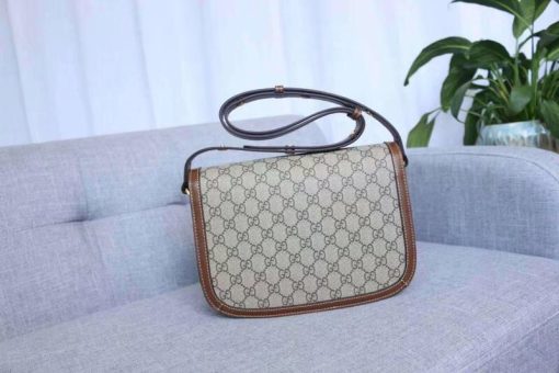 GUCCI 1955 Horsebit Shoulder Bag. Authentic quality luxury bag crafted in genuine leather comes with authenticity card, dust bag and gift bag. Timeless Elegance Meets Modern Versatility. The Gucci 1955 Horsebit bag, a recreation of an archival design, was introduced for Cruise 2020. Maintaining the same elegant lines and forms from over sixty years ago, this accessory seamlessly blends original details with a modern sensibility, placing emphasis on the iconic Horsebit. As an integral part of Gucci's genetic code, the double ring and bar design is recognized as one of the House's most distinctive elements drawn from the equestrian world. Showcased on a compact flap shoulder bag, the hardware is perfectly complemented by the House's recognizable monogram fabric. Furthermore, the bag incorporates a unique mechanism that allows for adjustable shoulder strap length, providing versatility for both shoulder and cross-body wear.