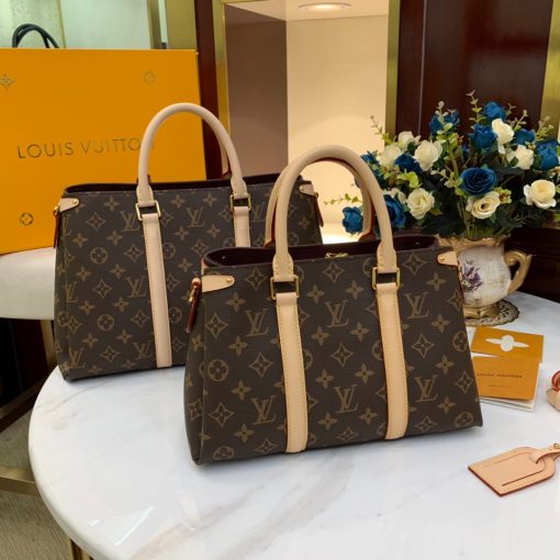 LOUIS VUITTON Soufflot. High-end quality bag including gift box, literature, dust bag, authenticity card. Made from Monogram canvas and featuring two lateral leather bands inspired by the iconic Keepall, the new Soufflot MM has a spacious, well-organized interior. It can be carried by hand and on the elbow with its articulated leather top handles, or on the shoulder, thanks to its removable and adjustable shoulder strap.