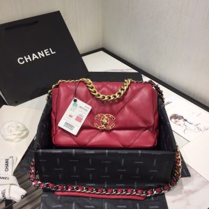 CHANEL '19' Flap Bag. Authentic quality luxury bag crafted in genuine leather comes with authenticity card, dust bag and gift bag. A Timeless Evolution of Elegance. Chanel's latest masterpiece, the Chanel 19 Bag, is the result of a collaboration with the brilliant designer Virginie Viard. This exquisite creation took center stage at the prestigious Paris Fashion Week, captivating fashion enthusiasts from around the world. Aptly named after its birth year, the Chanel 19 Bag draws inspiration from the iconic 2.55 bag, paying homage to its timeless elegance. - KRIS + KIKO CHANEL '19' Flap Bag. High-end quality bag including gift box, literature, dust bag, authenticity card. Chanel's newest bag was designed along with Virginie Viard, and it made its debut on the runway of Paris Fashion Week earlier this year. The bag, called the Chanel 19 Bag, is aptly named after its birth year, and it is said to be inspired by the classic 2.55 bag.