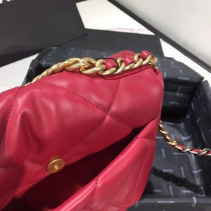 CHANEL '19' Flap Bag. Authentic quality luxury bag crafted in genuine leather comes with authenticity card, dust bag and gift bag. A Timeless Evolution of Elegance. Chanel's latest masterpiece, the Chanel 19 Bag, is the result of a collaboration with the brilliant designer Virginie Viard. This exquisite creation took center stage at the prestigious Paris Fashion Week, captivating fashion enthusiasts from around the world. Aptly named after its birth year, the Chanel 19 Bag draws inspiration from the iconic 2.55 bag, paying homage to its timeless elegance. - KRIS + KIKO CHANEL '19' Flap Bag. High-end quality bag including gift box, literature, dust bag, authenticity card. Chanel's newest bag was designed along with Virginie Viard, and it made its debut on the runway of Paris Fashion Week earlier this year. The bag, called the Chanel 19 Bag, is aptly named after its birth year, and it is said to be inspired by the classic 2.55 bag.