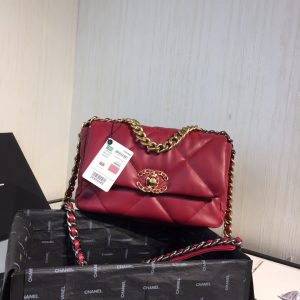 CHANEL '19' Flap Bag. Authentic quality luxury bag crafted in genuine leather comes with authenticity card, dust bag and gift bag. A Timeless Evolution of Elegance. Chanel's latest masterpiece, the Chanel 19 Bag, is the result of a collaboration with the brilliant designer Virginie Viard. This exquisite creation took center stage at the prestigious Paris Fashion Week, captivating fashion enthusiasts from around the world. Aptly named after its birth year, the Chanel 19 Bag draws inspiration from the iconic 2.55 bag, paying homage to its timeless elegance. - KRIS + KIKO CHANEL '19' Flap Bag. Authentic quality luxury bag crafted in genuine leather comes with authenticity card, dust bag and gift bag. A Timeless Evolution of Elegance. Chanel's latest masterpiece, the Chanel 19 Bag, is the result of a collaboration with the brilliant designer Virginie Viard. This exquisite creation took center stage at the prestigious Paris Fashion Week, captivating fashion enthusiasts from around the world. Aptly named after its birth year, the Chanel 19 Bag draws inspiration from the iconic 2.55 bag, paying homage to its timeless elegance.