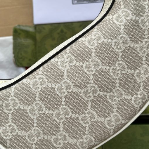 GUCCI Ophidia GG Mini Bag. Authentic quality luxury bag crafted in genuine leather comes with authenticity card, dust bag and gift bag. Step into a Retro Chic with Ophidia's Crescent Mini Bag The Ophidia world experiences a delightful enhancement with the addition of a mini bag boasting a charming crescent shape. Meticulously crafted using the House's esteemed monogram canvas, this half-moon silhouette embodies an irresistible nostalgic charm reminiscent of '90s designs.