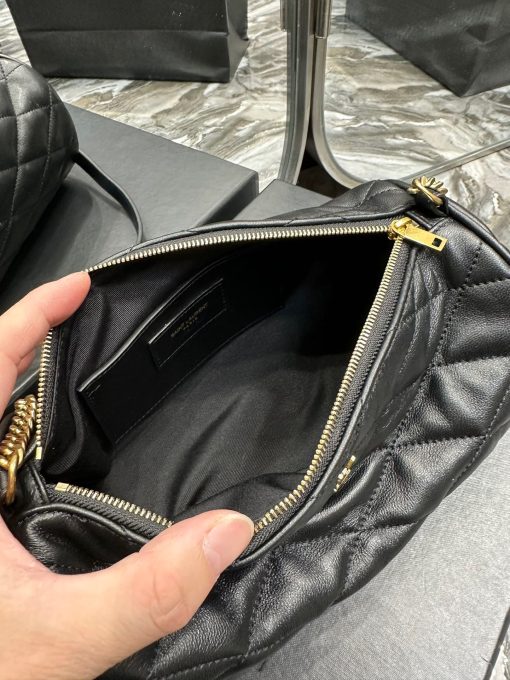 SAINT LAURENT Sade Tube Bag. Authentic quality luxury bag crafted in genuine leather comes with authenticity card, dust bag and gift bag. Indulge in timeless luxury with the YSL "Sade" shoulder bag - where elegance meets functionality. Introducing the exquisite "Sade" shoulder bag by Saint Laurent, crafted from quilted lambskin leather. Adorning the front is the iconic YSL logo lettering, adding a touch of elegance. The bag comes with a chain and leather shoulder strap for comfortable wearability, while the zip top closure ensures the security of your belongings. Inside, you'll find a convenient slip pocket for easy organization. Experience luxury and style with this quintessential Saint Laurent accessory.