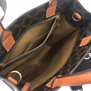 CELINE Vertical Cabas Tote in Triomphe Canvas and Calfskin. Authentic quality luxury bag crafted in genuine leather comes with authenticity card, dust bag and gift bag. A Collection of Timeless Elegance and Unyielding Style. Initially, the Triomphe bag faced indifference, but it is now gathering momentum and acclaim. The journey began with the CELINE Triomphe bag, a splendid creation honoring the iconic Arc de Triomphe. A new chapter unfolds as CELINE unveils a comprehensive range of the Triomphe line, which encompasses a tote bag, bucket bag, camera bag, drawstring bag, and a Boston bag. Crafted with Triomphe canvas and adorned with refined calfskin trimming, each style exudes an extraordinary allure. - KRIS + KIKO CELINE Vertical Cabas Tote in Triomphe Canvas and Calfskin. Original Quality Bag including gift box, literature, dust bag, authenticity card. The Triomphe bag wasn’t really loved in the beginning, but its gaining traction and fame. The story started with the CELINE Triomphe bag, a magnificent bag that’s named after the Arc the Triomphe. A new chapter has started, CELINE has completed an entire collection of the Triomphe line. It includes a tote bag, bucket bag, camera bag, drawstring bag, and a Boston bag. All of these styles are made from Triomphe canvas and with calfskin trimming.