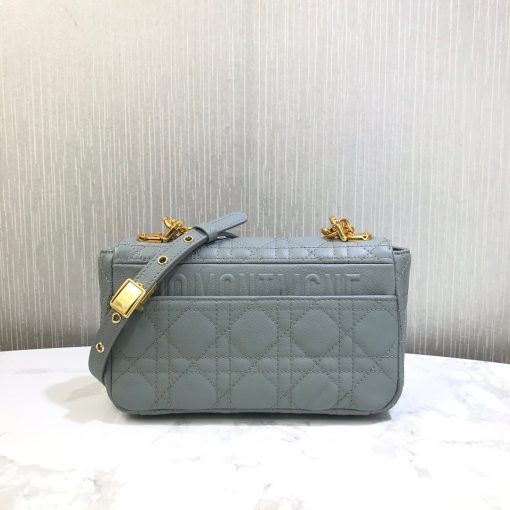 DIOR Small Caro Bag. Authentic quality luxury bag crafted in genuine leather comes with authenticity card, dust bag and gift bag. Timeless Elegance meets Versatile Style. The Dior Small Caro Bag is reminiscent of the Lady Dior Bag with its iconic Cannage Stitching, exuding both femininity and timeless style. The Cannage Stitching is instantly recognizable as one of the house's most historic and iconic patterns. At the center of the bag, a new metal twist CD Lock catches the eye with its large size. The top of the bag is adorned with a signature CD chain link shoulder strap, which can be swapped out for a wide embroidered strap to add a playful touch. This versatility allows for the bag to be perfectly paired with different outfits and looks. On the back of the bag, you'll find the distinguished 30 Montaigne signature embossed. Inside, the bag features one spacious main compartment along with interior zip and patch pockets for organization. Additionally, a convenient back pocket is available for quick and easy access to your essentials.
