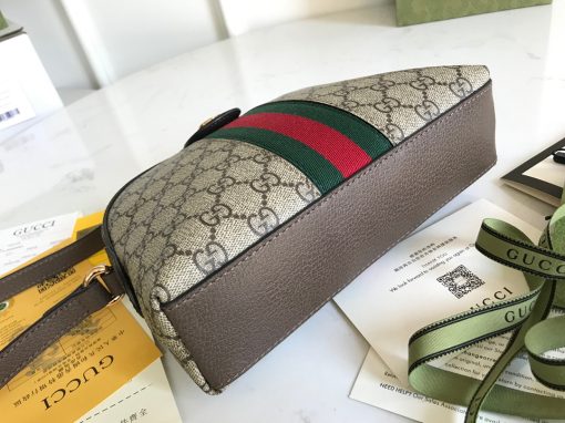 GUCCI Ophidia GG Small Rounded Top Shoulder Bag. Authentic quality luxury bag crafted in genuine leather comes with authenticity card, dust bag and gift bag. Heritage-inspired elegance meets modern sophistication: Embrace the timeless allure of our rounded top shoulder bag for effortless workwear style. Introducing this beautifully crafted rounded top shoulder bag, designed to evoke a sense of heritage in your accessories collection. With its iconic features, including the GG Supreme print, green and red Web detailing, and exquisite golden-tone hardware, this bag perfectly captures the essence of sought-after vintage items while offering a modern twist. Pair it with your tailored ensembles for a seamless transition from runway to workplace, effortlessly exuding fashionable workwear style.