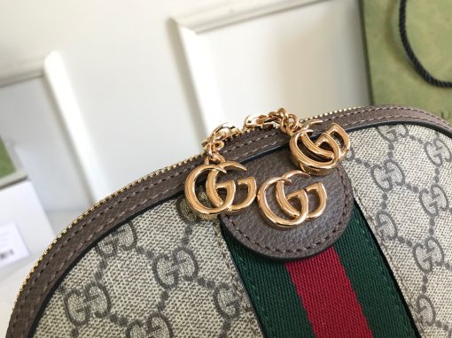 GUCCI Ophidia GG Small Rounded Top Shoulder Bag. Authentic quality luxury bag crafted in genuine leather comes with authenticity card, dust bag and gift bag. Heritage-inspired elegance meets modern sophistication: Embrace the timeless allure of our rounded top shoulder bag for effortless workwear style. Introducing this beautifully crafted rounded top shoulder bag, designed to evoke a sense of heritage in your accessories collection. With its iconic features, including the GG Supreme print, green and red Web detailing, and exquisite golden-tone hardware, this bag perfectly captures the essence of sought-after vintage items while offering a modern twist. Pair it with your tailored ensembles for a seamless transition from runway to workplace, effortlessly exuding fashionable workwear style.
