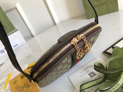 GUCCI Ophidia GG Small Rounded Top Shoulder Bag. Authentic quality luxury bag crafted in genuine leather comes with authenticity card, dust bag and gift bag. Heritage-inspired elegance meets modern sophistication: Embrace the timeless allure of our rounded top shoulder bag for effortless workwear style. Introducing this beautifully crafted rounded top shoulder bag, designed to evoke a sense of heritage in your accessories collection. With its iconic features, including the GG Supreme print, green and red Web detailing, and exquisite golden-tone hardware, this bag perfectly captures the essence of sought-after vintage items while offering a modern twist. Pair it with your tailored ensembles for a seamless transition from runway to workplace, effortlessly exuding fashionable workwear style.
