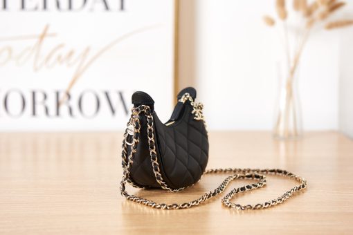 CHANEL Clutch With Chain. Authentic quality luxury bag crafted in genuine leather comes with authenticity card, dust bag and gift bag. The epitome of cuteness and luxury in one compact package. Introducing one of the most adorable mini bags ever crafted, the Clutch with Chain from the Cruise 2022/23 collection. This charming pouch is skillfully made with luxurious lambskin leather and adorned with shiny light gold-tone hardware. It also comes with a long chain for effortless shoulder carry.