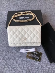 CHANEL Classic Wallet on Chain. Authentic quality luxury bag crafted in genuine leather comes with authenticity card, dust bag and gift bag. Elevate your elegance with the timeless allure of a Chanel bag. A Chanel bag is a true symbol of timeless sophistication and grace, effortlessly elevating any ensemble. Exemplifying this essence is the exquisite caviar leather flap wallet on chain, celebrating the brand's iconic elegance. Adorned with a mesmerizing diamond quilted pattern, complimented by opulent metal-tone hardware, and secured by a chic foldover top with a CC turn-lock fastening, this piece exudes nothing short of refinement. With its thoughtfully designed interior, including an internal zipped pocket, slip pocket, and logo stamp, as well as the added convenience of a back slip pocket, this wallet on chain seamlessly blends both style and practicality. The tasteful tortoiseshell details serve as an impeccable finishing touch, emanating an allure that is truly captivating. - KRIS + KIKO CHANEL Classic Wallet on Chain. Authentic Quality Wallet, including gift box, literature, dust bag, authenticity card. Classic and elegant, a Chanel bag is a fashion statement to your outfit, as seen in this caviar leather flap wallet on chain. Featuring a diamond quilted finish, metal-tone hardware, a foldover top, an internal zipped pocket, an internal slip pocket, an internal logo stamp, a back slip pocket, tortoiseshell details, and a CC turn-lock fastening.