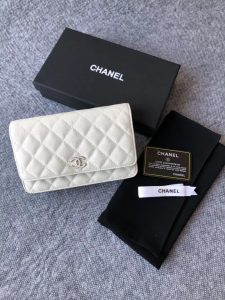 CHANEL Classic Wallet on Chain. Authentic quality luxury bag crafted in genuine leather comes with authenticity card, dust bag and gift bag. Elevate your elegance with the timeless allure of a Chanel bag. A Chanel bag is a true symbol of timeless sophistication and grace, effortlessly elevating any ensemble. Exemplifying this essence is the exquisite caviar leather flap wallet on chain, celebrating the brand's iconic elegance. Adorned with a mesmerizing diamond quilted pattern, complimented by opulent metal-tone hardware, and secured by a chic foldover top with a CC turn-lock fastening, this piece exudes nothing short of refinement. With its thoughtfully designed interior, including an internal zipped pocket, slip pocket, and logo stamp, as well as the added convenience of a back slip pocket, this wallet on chain seamlessly blends both style and practicality. The tasteful tortoiseshell details serve as an impeccable finishing touch, emanating an allure that is truly captivating. - KRIS + KIKO CHANEL Classic Wallet on Chain. Authentic Quality Wallet, including gift box, literature, dust bag, authenticity card. Classic and elegant, a Chanel bag is a fashion statement to your outfit, as seen in this caviar leather flap wallet on chain. Featuring a diamond quilted finish, metal-tone hardware, a foldover top, an internal zipped pocket, an internal slip pocket, an internal logo stamp, a back slip pocket, tortoiseshell details, and a CC turn-lock fastening.