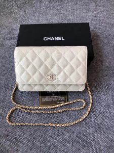 CHANEL Classic Wallet on Chain. Authentic quality luxury bag crafted in genuine leather comes with authenticity card, dust bag and gift bag. Elevate your elegance with the timeless allure of a Chanel bag. A Chanel bag is a true symbol of timeless sophistication and grace, effortlessly elevating any ensemble. Exemplifying this essence is the exquisite caviar leather flap wallet on chain, celebrating the brand's iconic elegance. Adorned with a mesmerizing diamond quilted pattern, complimented by opulent metal-tone hardware, and secured by a chic foldover top with a CC turn-lock fastening, this piece exudes nothing short of refinement. With its thoughtfully designed interior, including an internal zipped pocket, slip pocket, and logo stamp, as well as the added convenience of a back slip pocket, this wallet on chain seamlessly blends both style and practicality. The tasteful tortoiseshell details serve as an impeccable finishing touch, emanating an allure that is truly captivating. - KRIS + KIKO CHANEL Classic Wallet on Chain. Authentic Quality Wallet, including gift box, literature, dust bag, authenticity card. Classic and elegant, a Chanel bag is a fashion statement to your outfit, as seen in this caviar leather flap wallet on chain. Featuring a diamond quilted finish, metal-tone hardware, a foldover top, an internal zipped pocket, an internal slip pocket, an internal logo stamp, a back slip pocket, tortoiseshell details, and a CC turn-lock fastening.
