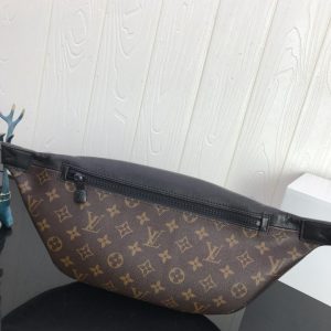 LOUIS VUITTON Discovery Bumbag. Authentic quality luxury bag crafted in genuine leather comes with authenticity card, dust bag and gift bag. Discover the perfect blend of style and practicality with the Discovery Bumbag - Your city companion reimagined. The Discovery Bumbag effortlessly blends casual elegance with modern functionality, making it the ideal companion for urban living. Crafted from the luxurious Monogram Eclipse canvas or Monogram Shadow leather, this bag is enhanced with convenient zippered pockets on both the front and back, ensuring quick and effortless access to your belongings. Its adjustable belt and ergonomic design offer both style and comfort, allowing you to wear it across the chest, over the shoulder, or simply around the waist. - KRIS + KIKO LOUIS VUITTON Discovery Bum Bag. Combining casual sophistication with contemporary practicality, the Discovery Bumbag is the perfect city companion. It is fashioned from Monogram Eclipse canvas/Monogram Shadow leather and adorned with zipped pockets on the front and back for easy access. With its adjustable belt and body-friendly design, it can be worn stylishly slung across the chest, draped over the shoulder or simply strapped around the waist.