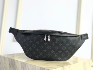 LOUIS VUITTON Discovery Bumbag. Authentic quality luxury bag crafted in genuine leather comes with authenticity card, dust bag and gift bag. Discover the perfect blend of style and practicality with the Discovery Bumbag - Your city companion reimagined. The Discovery Bumbag effortlessly blends casual elegance with modern functionality, making it the ideal companion for urban living. Crafted from the luxurious Monogram Eclipse canvas or Monogram Shadow leather, this bag is enhanced with convenient zippered pockets on both the front and back, ensuring quick and effortless access to your belongings. Its adjustable belt and ergonomic design offer both style and comfort, allowing you to wear it across the chest, over the shoulder, or simply around the waist. - KRIS + KIKO LOUIS VUITTON Discovery Bum Bag. Combining casual sophistication with contemporary practicality, the Discovery Bumbag is the perfect city companion. It is fashioned from Monogram Eclipse canvas/Monogram Shadow leather and adorned with zipped pockets on the front and back for easy access. With its adjustable belt and body-friendly design, it can be worn stylishly slung across the chest, draped over the shoulder or simply strapped around the waist.
