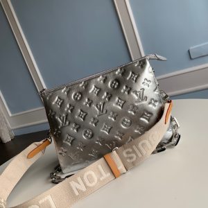 LOUIS VUITTON Coussin PM Bag. Authentic quality luxury bag crafted in genuine leather comes with authenticity card, dust bag and gift bag. Effortless Style Meets Luxury. Undoubtedly, the LOUIS VUITTON Le Coussin has established itself as the must-have bag of the season within the fashion industry. Introduced as a part of their Spring/Summer 2021 collection, this remarkable bag has already garnered attention and found its way into the hands of fashion-savvy individuals, influencers, and trendsetting celebrities. The French term "Coussin," meaning cushion, perfectly encapsulates the essence of this bag, crafted from luxurious and pliable puffy leather adorned with the iconic LV monogram pattern. It offers the versatility of being worn cross-body with the accompanying strap, wielded as a chain baguette, or elegantly cradled under the arm. Effortlessly enhancing even the simplest ensembles, the pillow-like Coussin bag exudes an inherent, forward-looking allure, making a statement in the world of fashion. - KRIS + KIKO LOUS VUITTON Coussin PM Handbag. There’s no doubt that the Louis Vuitton Le Coussin is the fashion house’s it-bag of the season. Launched as part of their Spring / Summer 2021 collection, this striking bag is already making heads turn and has quickly landed on the arms of fashionistas, influencers and trend-setting celebrities. French for the word cushion, the Coussin is made from soft and supple puffy leather that is embossed with the LV monogram pattern. It can be worn cross-body with the strap, as a chain baguette, or comfortably carried under the arm. The pillow-like bag brings style to the most simple look, giving it an effortless fashion-forward allure.