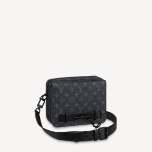 LOUIS VUITTON Steamer Messenger. Authentic quality luxury bag crafted in genuine leather comes with authenticity card, dust bag and gift bag. Timeless Elegance Meets Modern Functionality. Introducing the elegant addition to the New Classics collection - the Messenger. Imbued with the timeless sophistication of LOUIS VUITTON heritage, this exquisite piece showcases the fusion of supple Monogram Taurillon leather and Monogram Eclipse canvas. Signature details, such as the steamer-style chain, adorn this messenger beautifully. Boasting practicality, it is effortlessly carried with its removable strap. Inside, a generous zipped compartment awaits, ensuring ample storage, while a front flap pocket with a secure magnetic closure provides added convenience. - KRIS + KIKO LOUIS VUITTON Steamer Messenger. The new Messenger brings a sophisticated touch of Louis Vuitton heritage to the New Classics collection. Supple Monogram Taurillon leather/Monogram Eclipse canvas are accented by signature features like a steamer-style chain. Easy to carry with its removable strap, it offers a spacious zipped compartment plus a front flap pocket with a secure magnetic closure.