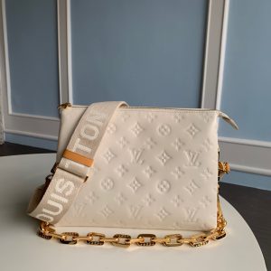 LOUIS VUITTON Coussin PM Bag. Authentic quality luxury bag crafted in genuine leather comes with authenticity card, dust bag and gift bag. Effortless Style Meets Luxury. Undoubtedly, the LOUIS VUITTON Le Coussin has established itself as the must-have bag of the season within the fashion industry. Introduced as a part of their Spring/Summer 2021 collection, this remarkable bag has already garnered attention and found its way into the hands of fashion-savvy individuals, influencers, and trendsetting celebrities. The French term "Coussin," meaning cushion, perfectly encapsulates the essence of this bag, crafted from luxurious and pliable puffy leather adorned with the iconic LV monogram pattern. It offers the versatility of being worn cross-body with the accompanying strap, wielded as a chain baguette, or elegantly cradled under the arm. Effortlessly enhancing even the simplest ensembles, the pillow-like Coussin bag exudes an inherent, forward-looking allure, making a statement in the world of fashion. - KRIS + KIKO LOUS VUITTON Coussin PM Handbag. There’s no doubt that the Louis Vuitton Le Coussin is the fashion house’s it-bag of the season. Launched as part of their Spring / Summer 2021 collection, this striking bag is already making heads turn and has quickly landed on the arms of fashionistas, influencers and trend-setting celebrities. French for the word cushion, the Coussin is made from soft and supple puffy leather that is embossed with the LV monogram pattern. It can be worn cross-body with the strap, as a chain baguette, or comfortably carried under the arm. The pillow-like bag brings style to the most simple look, giving it an effortless fashion-forward allure.