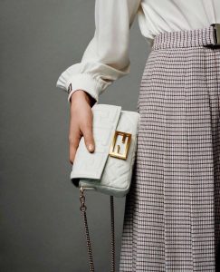 FENDI Baguette Shoulder Bag. Authentic quality luxury bag crafted in genuine leather comes with authenticity card, dust bag and gift bag. Rediscover the Icon. Introducing the highly anticipated comeback of the original It bag. As the Nineties trend continues to captivate fashion enthusiasts, Fendi's iconic Baguette bag, first introduced in 1997, takes the spotlight once again. Back then, the Baguette revolutionized bag fashion, capturing the hearts of women who desired to possess multiple designs. Unlike its predecessors, such as Chanel's 2.55 and Hermes' Kelly and Birkin styles, the Baguette was not only fashionable but also innovative. Its allure was twofold - a wide range of captivating designs to collect and a convenient and comfortable silhouette to carry. The return of this coveted accessory is a testament to its enduring desirability. - KRIS + KIKO FENDI Baguette Shoulder Bag. High-End Quality Bag.. Authentic Style. Genuine Calf Leather. Metal Hardware. Authentic Packaging. Original Quality and Look Dust Bag. The original It bag is back. As the trend for everything the Nineties rolls on, it’s only right that Fendi’s iconic Baguette bag, which was created in 1997, has another turn in the spotlight. At the time, the Baguette quickly transcended any previous bag trends and became a phenomenon with women desperate to own as many designs as possible. There had never been such a fashionable yet high-end bag - yes, there were classics like Chanel’s 2.55 and Hermes’ Kelly and Birkin styles but the Baguette was new and fashion-led. It’s desirability was two-fold… there were dozens of different designs to collect and it came in a tactile easy-to-carry silhouette.