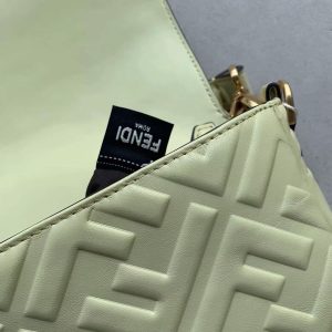 FENDI Baguette Shoulder Bag. Authentic quality luxury bag crafted in genuine leather comes with authenticity card, dust bag and gift bag. Rediscover the Icon. Introducing the highly anticipated comeback of the original It bag. As the Nineties trend continues to captivate fashion enthusiasts, Fendi's iconic Baguette bag, first introduced in 1997, takes the spotlight once again. Back then, the Baguette revolutionized bag fashion, capturing the hearts of women who desired to possess multiple designs. Unlike its predecessors, such as Chanel's 2.55 and Hermes' Kelly and Birkin styles, the Baguette was not only fashionable but also innovative. Its allure was twofold - a wide range of captivating designs to collect and a convenient and comfortable silhouette to carry. The return of this coveted accessory is a testament to its enduring desirability. - KRIS + KIKO FENDI Baguette Shoulder Bag. Authentic quality luxury bag crafted in genuine leather comes with authenticity card, dust bag and gift bag. Rediscover the Icon. Introducing the highly anticipated comeback of the original It bag. As the Nineties trend continues to captivate fashion enthusiasts, Fendi's iconic Baguette bag, first introduced in 1997, takes the spotlight once again. Back then, the Baguette revolutionized bag fashion, capturing the hearts of women who desired to possess multiple designs. Unlike its predecessors, such as Chanel's 2.55 and Hermes' Kelly and Birkin styles, the Baguette was not only fashionable but also innovative. Its allure was twofold - a wide range of captivating designs to collect and a convenient and comfortable silhouette to carry. The return of this coveted accessory is a testament to its enduring desirability.
