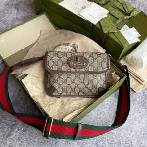 GUCCI Neo Vintage GG Supreme Belt Bag. Authentic quality luxury bag crafted in genuine leather comes with authenticity card, dust bag and gift bag. Retro charm, sustainable grace. The GG Supreme belt bag exudes a tasteful vintage charm, showcasing a design that draws inspiration from the past. Constructed with genuine leather accents, this exquisite piece is designed to be comfortably worn around the waist, fastened securely with a stylish Web strap and buckle closure. Crafted from environmentally conscious beige/ebony GG Supreme canvas and adorned with brown leather trims, this bag exemplifies both style and sustainability. It proudly displays the iconic green and red Web detailing, embodying the unmistakable Gucci essence. Additionally, it features an oval-shaped Gucci leather tag adorned with a captivating feline head emblem. The adjustable nylon Web belt offers flexibility and convenience, guaranteed by a sturdy plastic buckle closure. - KRIS + KIKO GUCCI Neo Vintage GG Supreme belt bag. The belt bag in GG Supreme has a retro-influenced design. Trimmed with leather, the style is meant to be worn around the waist, securing with a Web strap and buckle closure. Beige/ebony GG Supreme canvas, a material with low environmental impact, with brown leather trims. Green and red Web. Oval Gucci leather tag with a feline head. Adjustable nylon Web belt with plastic buckle closure.