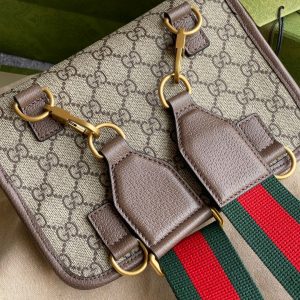GUCCI Neo Vintage GG Supreme Belt Bag. Authentic quality luxury bag crafted in genuine leather comes with authenticity card, dust bag and gift bag. Retro charm, sustainable grace. The GG Supreme belt bag exudes a tasteful vintage charm, showcasing a design that draws inspiration from the past. Constructed with genuine leather accents, this exquisite piece is designed to be comfortably worn around the waist, fastened securely with a stylish Web strap and buckle closure. Crafted from environmentally conscious beige/ebony GG Supreme canvas and adorned with brown leather trims, this bag exemplifies both style and sustainability. It proudly displays the iconic green and red Web detailing, embodying the unmistakable Gucci essence. Additionally, it features an oval-shaped Gucci leather tag adorned with a captivating feline head emblem. The adjustable nylon Web belt offers flexibility and convenience, guaranteed by a sturdy plastic buckle closure. - KRIS + KIKO GUCCI Neo Vintage GG Supreme Belt Bag. Authentic quality luxury bag crafted in genuine leather comes with authenticity card, dust bag and gift bag. Retro charm, sustainable grace. The GG Supreme belt bag exudes a tasteful vintage charm, showcasing a design that draws inspiration from the past. Constructed with genuine leather accents, this exquisite piece is designed to be comfortably worn around the waist, fastened securely with a stylish Web strap and buckle closure. Crafted from environmentally conscious beige/ebony GG Supreme canvas and adorned with brown leather trims, this bag exemplifies both style and sustainability. It proudly displays the iconic green and red Web detailing, embodying the unmistakable Gucci essence. Additionally, it features an oval-shaped Gucci leather tag adorned with a captivating feline head emblem. The adjustable nylon Web belt offers flexibility and convenience, guaranteed by a sturdy plastic buckle closure.