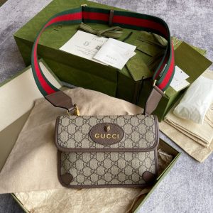 GUCCI Neo Vintage GG Supreme Belt Bag. Authentic quality luxury bag crafted in genuine leather comes with authenticity card, dust bag and gift bag. Retro charm, sustainable grace. The GG Supreme belt bag exudes a tasteful vintage charm, showcasing a design that draws inspiration from the past. Constructed with genuine leather accents, this exquisite piece is designed to be comfortably worn around the waist, fastened securely with a stylish Web strap and buckle closure. Crafted from environmentally conscious beige/ebony GG Supreme canvas and adorned with brown leather trims, this bag exemplifies both style and sustainability. It proudly displays the iconic green and red Web detailing, embodying the unmistakable Gucci essence. Additionally, it features an oval-shaped Gucci leather tag adorned with a captivating feline head emblem. The adjustable nylon Web belt offers flexibility and convenience, guaranteed by a sturdy plastic buckle closure. - KRIS + KIKO GUCCI Neo Vintage GG Supreme belt bag. The belt bag in GG Supreme has a retro-influenced design. Trimmed with leather, the style is meant to be worn around the waist, securing with a Web strap and buckle closure. Beige/ebony GG Supreme canvas, a material with low environmental impact, with brown leather trims. Green and red Web. Oval Gucci leather tag with a feline head. Adjustable nylon Web belt with plastic buckle closure.