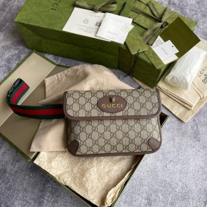 GUCCI Neo Vintage GG Supreme Belt Bag. Authentic quality luxury bag crafted in genuine leather comes with authenticity card, dust bag and gift bag. Retro charm, sustainable grace. The GG Supreme belt bag exudes a tasteful vintage charm, showcasing a design that draws inspiration from the past. Constructed with genuine leather accents, this exquisite piece is designed to be comfortably worn around the waist, fastened securely with a stylish Web strap and buckle closure. Crafted from environmentally conscious beige/ebony GG Supreme canvas and adorned with brown leather trims, this bag exemplifies both style and sustainability. It proudly displays the iconic green and red Web detailing, embodying the unmistakable Gucci essence. Additionally, it features an oval-shaped Gucci leather tag adorned with a captivating feline head emblem. The adjustable nylon Web belt offers flexibility and convenience, guaranteed by a sturdy plastic buckle closure. - KRIS + KIKO GUCCI Neo Vintage GG Supreme Belt Bag. Authentic quality luxury bag crafted in genuine leather comes with authenticity card, dust bag and gift bag. Retro charm, sustainable grace. The GG Supreme belt bag exudes a tasteful vintage charm, showcasing a design that draws inspiration from the past. Constructed with genuine leather accents, this exquisite piece is designed to be comfortably worn around the waist, fastened securely with a stylish Web strap and buckle closure. Crafted from environmentally conscious beige/ebony GG Supreme canvas and adorned with brown leather trims, this bag exemplifies both style and sustainability. It proudly displays the iconic green and red Web detailing, embodying the unmistakable Gucci essence. Additionally, it features an oval-shaped Gucci leather tag adorned with a captivating feline head emblem. The adjustable nylon Web belt offers flexibility and convenience, guaranteed by a sturdy plastic buckle closure.