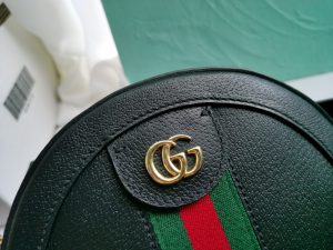 GUCCI GG Marmont Mini Leather Round Shoulder Bag. Authentic quality luxury bag crafted in genuine leather comes with authenticity card, dust bag and gift bag. Effortlessly chic, this shoulder bag proves that good things come in small packages. This delightful shoulder bag is definitely a perfect choice! Mini bags are incredibly popular this season, and it's great to show our support for this trend. Gucci has designed this bag specifically for carrying essentials - your phone will be easily accessible, your credit card can be conveniently kept in your pocket, and your lipstick will last you all day long. Made from either plain or quilted leather, this fun-sized accessory features a stylish chain and leather shoulder strap, as well as the iconic metal GG logo. Sometimes, the best things truly do come in small packages. With a top zip closure and beautiful gold or silver-tone hardware, this shoulder bag completes the package. - KRIS + KIKO GUCCI GG Marmont Mini Leather Round Shoulder Bag. This Gucci GG Marmont mini round shoulder bag certainly seems to fit the bill! Mini bags are hot this season and we could be more supportive of this trend. This bag from Gucci is only for essentials, the phone will be on your hands, the credit card in your pocket and your lipstick have a 24-hour duration. Crafted from plain/quilted leather, this fun-size accessory has a chain and leather shoulder strap and is adorned with the signature metal GG logo. All the best things come in small packages. Featuring a top zip fastening and gold-tone/silver-tone hardware.