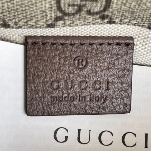 GUCCI Neo Vintage GG Supreme Belt Bag. Authentic quality luxury bag crafted in genuine leather comes with authenticity card, dust bag and gift bag. Retro charm, sustainable grace. The GG Supreme belt bag exudes a tasteful vintage charm, showcasing a design that draws inspiration from the past. Constructed with genuine leather accents, this exquisite piece is designed to be comfortably worn around the waist, fastened securely with a stylish Web strap and buckle closure. Crafted from environmentally conscious beige/ebony GG Supreme canvas and adorned with brown leather trims, this bag exemplifies both style and sustainability. It proudly displays the iconic green and red Web detailing, embodying the unmistakable Gucci essence. Additionally, it features an oval-shaped Gucci leather tag adorned with a captivating feline head emblem. The adjustable nylon Web belt offers flexibility and convenience, guaranteed by a sturdy plastic buckle closure. - KRIS + KIKO GUCCI Neo Vintage GG Supreme Belt Bag. Authentic quality luxury bag crafted in genuine leather comes with authenticity card, dust bag and gift bag. Retro charm, sustainable grace. The GG Supreme belt bag exudes a tasteful vintage charm, showcasing a design that draws inspiration from the past. Constructed with genuine leather accents, this exquisite piece is designed to be comfortably worn around the waist, fastened securely with a stylish Web strap and buckle closure. Crafted from environmentally conscious beige/ebony GG Supreme canvas and adorned with brown leather trims, this bag exemplifies both style and sustainability. It proudly displays the iconic green and red Web detailing, embodying the unmistakable Gucci essence. Additionally, it features an oval-shaped Gucci leather tag adorned with a captivating feline head emblem. The adjustable nylon Web belt offers flexibility and convenience, guaranteed by a sturdy plastic buckle closure.