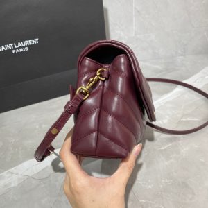 SAINT LAURENT Toy Loulou Matelassé Mini Bag. Authentic quality luxury bag crafted in genuine leather comes with authenticity card, dust bag and gift bag. Embrace Your Inner Rock and Roll Chic. The SAINT LAURENT Toy Loulou Matelassé Mini Bag can be described as a beautifully feminine accessory with a touch of rebellious charm. Its standout feature is the padded quilted leather, which adds volume and texture. The leather chain handles and metal interlocking YSL initials on the front flap give the bag a daring yet timeless allure, making it a luxurious statement piece. The versatility of the YSL LouLou bag is truly impressive, as it can effortlessly transition from casual to formal occasions. The adjustable chain strap allows for the option of wearing it as a crossbody bag, adding to its adaptability. - KRIS + KIKO SAINT LAURENT Toy Loulou Matelassé Mini Bag. Authentic quality luxury bag crafted in genuine leather comes with authenticity card, dust bag and gift bag. Embrace Your Inner Rock and Roll Chic. The SAINT LAURENT Toy Loulou Matelassé Mini Bag can be described as a beautifully feminine accessory with a touch of rebellious charm. Its standout feature is the padded quilted leather, which adds volume and texture. The leather chain handles and metal interlocking YSL initials on the front flap give the bag a daring yet timeless allure, making it a luxurious statement piece. The versatility of the YSL LouLou bag is truly impressive, as it can effortlessly transition from casual to formal occasions. The adjustable chain strap allows for the option of wearing it as a crossbody bag, adding to its adaptability.