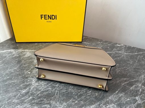 FENDI Peekaboo Iseeu Small Bag. Authentic quality luxury bag crafted in genuine leather comes with authenticity card, dust bag and gift bag. Unveil your style with the ISeeU: A small, iconic bag that speaks volumes. Introducing the sleek and timeless ISeeU bag, a compact yet noteworthy Peekaboo design meticulously crafted from luxurious leather. This exquisite creation is adorned with the iconic twist lock on both sides, enhancing its elegance. Versatility is at its core, as this bag can be effortlessly carried by hand or daintily worn on the shoulder or cross-body. With its convenient handle and adjustable, detachable shoulder strap, the choice is yours to embrace your personal style.