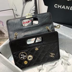CHANEL Flap Bag with Charms. Authentic quality luxury bag crafted in genuine leather comes with authenticity card, dust bag and gift bag. Unveiling the Perfect Blend: Effortless Style meets Punk Chic. We are incredibly fond of the square-shaped design that includes a conveniently built-in handle, perfect for hand-carrying. The bag is adorned with charming accents that exude a dazzling Punk vibe. At the heart of it all, you'll find the iconic CC logo, beautifully placed, while the addition of a woven leather chain strap allows for a stylish and comfortable shoulder carry. - KRIS + KIKO CHANEL Flap Bag with Charms. Authentic quality luxury bag crafted in genuine leather comes with authenticity card, dust bag and gift bag. Unveiling the Perfect Blend: Effortless Style meets Punk Chic. We are incredibly fond of the square-shaped design that includes a conveniently built-in handle, perfect for hand-carrying. The bag is adorned with charming accents that exude a dazzling Punk vibe. At the heart of it all, you'll find the iconic CC logo, beautifully placed, while the addition of a woven leather chain strap allows for a stylish and comfortable shoulder carry.