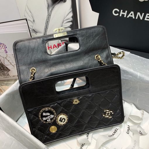 CHANEL Flap Bag with Charms. Authentic quality luxury bag crafted in genuine leather comes with authenticity card, dust bag and gift bag. Unveiling the Perfect Blend: Effortless Style meets Punk Chic. We are incredibly fond of the square-shaped design that includes a conveniently built-in handle, perfect for hand-carrying. The bag is adorned with charming accents that exude a dazzling Punk vibe. At the heart of it all, you'll find the iconic CC logo, beautifully placed, while the addition of a woven leather chain strap allows for a stylish and comfortable shoulder carry.