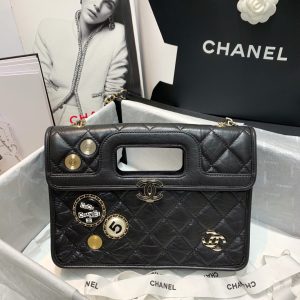 CHANEL Flap Bag with Charms. Authentic quality luxury bag crafted in genuine leather comes with authenticity card, dust bag and gift bag. Unveiling the Perfect Blend: Effortless Style meets Punk Chic. We are incredibly fond of the square-shaped design that includes a conveniently built-in handle, perfect for hand-carrying. The bag is adorned with charming accents that exude a dazzling Punk vibe. At the heart of it all, you'll find the iconic CC logo, beautifully placed, while the addition of a woven leather chain strap allows for a stylish and comfortable shoulder carry. - KRIS + KIKO CHANEL Flap Bag with Charms, best high-end quality bag with gift box, dust bag, authenticity card, and CHANEL cloth flower. We love the square-shaped design with a built-in handle for hand carry. Charms give the bag a Punk feel. The center features the CC logo and a woven leather chain strap allows for shoulder carry.