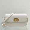 DIOR 30 Montaigne Avenue Bag. Original Quality Bag including gift box, care book, dust bag, authenticity card. The 30 Montaigne Avenue bag enhances the hallmark line with a timeless and elegant style. Crafted in box calfskin, the rounded flap with delicate curves is punctuated by an antique gold-finish metal CD clasp inspired by the seal of a Christian Dior perfume bottle. The design is completed by other details, like the 30 Montaigne signature embossed on the back and the signature chain alternating gold-finish metal and tonal enamel links that match the leather. The gusseted bag features a spacious and refined silhouette that can be carried by hand, worn over the shoulder or crossbody.