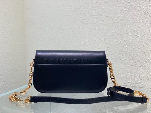 DIOR 30 Montaigne Avenue Bag. Authentic quality luxury bag crafted in genuine leather comes with authenticity card, dust bag and gift bag. Elevate your style with this timeless elegance. The 30 Montaigne Avenue bag embodies the essence of the hallmark line, exuding a timeless and sophisticated style. Meticulously crafted from box calfskin, the rounded flap possesses graceful curves that are accentuated by an antique gold-finish metal CD clasp, reminiscent of the seal found on a Christian Dior perfume bottle. Adding to its allure, the bag boasts additional details, such as the 30 Montaigne signature subtly embossed on the back, and a signature chain adorned with alternating gold-finish metal and tonal enamel links that effortlessly complement the luxurious leather. With its gusseted construction, the bag presents a spacious and refined silhouette, offering versatility as it can be elegantly carried by hand, comfortably worn over the shoulder, or effortlessly slung across the body.