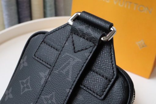 LOUIS VUITTON Taigarama Outdoor Slingbag. Authentic quality luxury bag crafted in genuine leather comes with authenticity card, dust bag and gift bag. Embrace Style and Functionality with the Outdoor Sling Bag - Designed for Active Adventurers! Introducing the Outdoor Sling Bag from the remarkable Taigarama collection, a sleek and convenient model perfect for sports enthusiasts. Crafted with a blend of tonal signature canvas and luxurious Taiga leather, this bag offers both style and durability. Its compact size allows for carrying essential items effortlessly, while the front pocket provides a secure storage space for earphones or keys. The adjustable shoulder strap effortlessly adjusts for comfortable left or right carry, catering to your individual preference.